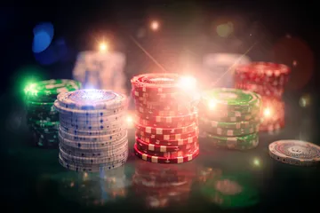 A close-up shot of golden coins falling around a spinning roulette wheel, representing immersive casino action at SPINARA.