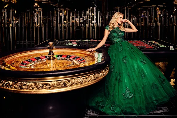 SPINARA Jackpot Slots — Spin for massive rewards A dramatic shot of winning sevens landing on a slot reel surrounded by shining gold coins, symbolizing big wins.
