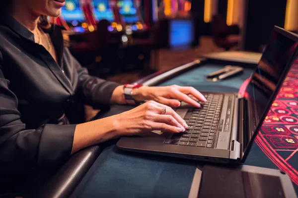 SPINARA Secure Login — Fast and safe account entry A laptop glowing with a bright login prompt in a minimalistic setup, symbolizing the protected access system at SPINARA.